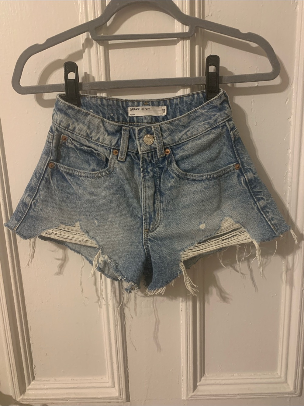 GARAGE festival denim low/mid rise mini shorts. Cute light blue distressed color